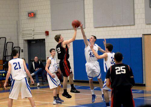 Senior Matti Fuller (#42) battles for a ball in Saturday's game.