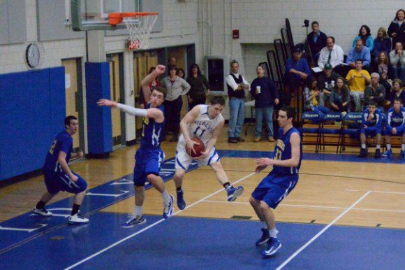 Andrew Tyrol grabs the ball after a shot by H-K.