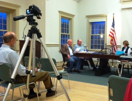 Bob Dunn reads his and Phil Neaton's resignation letter to the Old Lyme Board of Selectmen at yesterday's meeting.