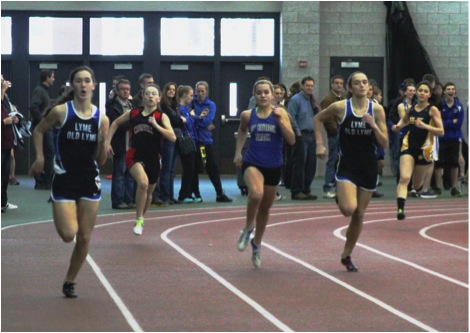 Samantha Lee and Ali Scott race for the finish in the 300 Meter Dash.