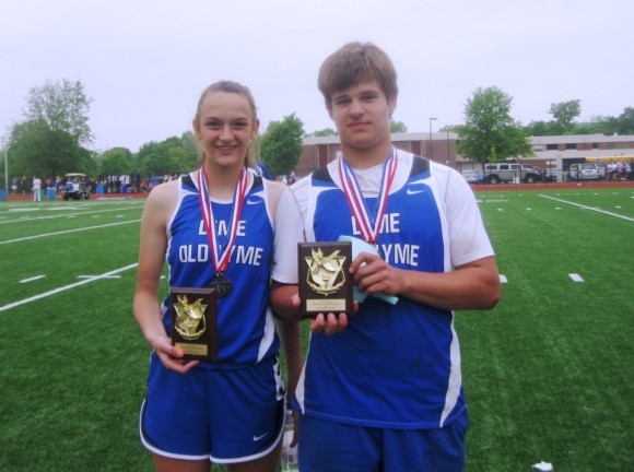 Alison Scott and Jared Stanland stand proudly with their awards after their first place successes int All- Shoreline Track and Field meet held Wednesday.