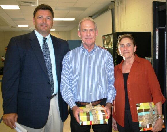 From left to right, Lyme-Old Lyme High School Principal Jim Wygonik stands with Athletic Director Rob Roach and Classics teacher Marlene Estabrooks.