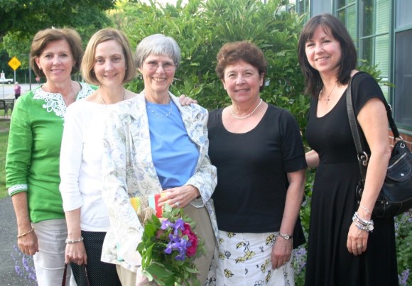 Linda Stannard (center)stands surrounded by her colleagues in the second grade team at Mile Creek School.