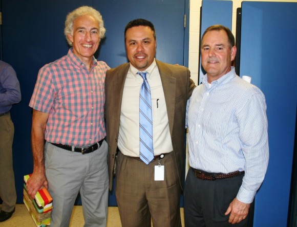 Lyme-Old Lyme Middle School Principal Chris Pomroy joins science teacher Richard LaMesa (left) and School Counselor Don Desautels.