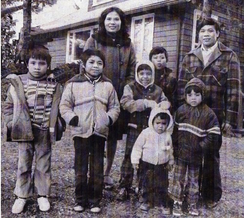 A file photo of the Patana family shortly after their arrival in January 1980.  Sichanh is pictured front row, far right and his father stands behind him.