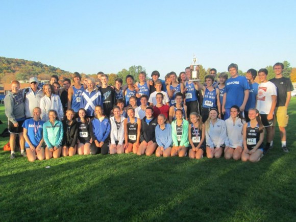 LOLHS girls and boys cross-country teams celebrate the boy's victory. 