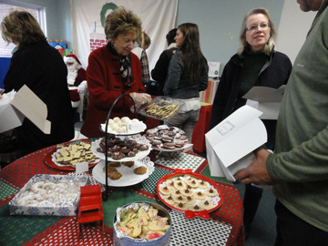 What shall I buy? Customers are spoiled for choice at Child & Family's Annual Cookie Walk.