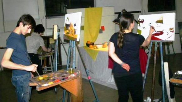 Chair of Painting Susan Stephenson (right) demonstrates painting techniques.