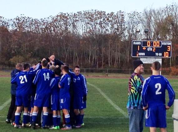 The Wildcats celebrate their victory.