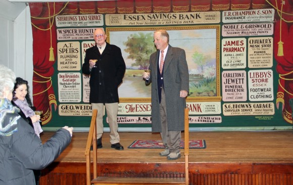 Board member Mark Lander (left) and Co-Chair Tim Griswold (right) address the crowd gathered to celebrate the purchase of the old Lyme Grange by the Old Lyme Historical Society.