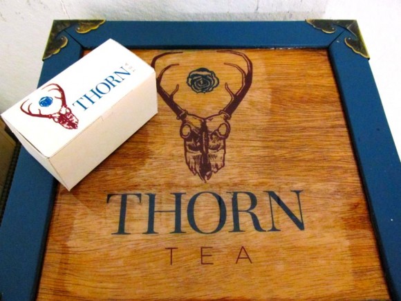 Thorn Tea packaging features Erik Peterson's original designs.