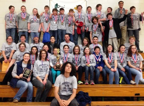 Lyme-Old Lyme Middle School science team members display their medals after both LOLMS teams shared  first place honors in the state tournament.
