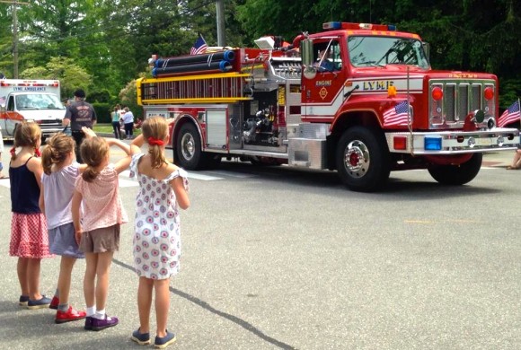 Watching the parade -- is that a salute?