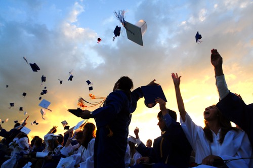 Hats high!  Lyme-Old Lyme High School graduates celebrate their success.  Photo by Kim Tyler.