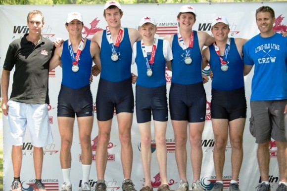 Pictured from left to right Sean Wolf from King Boats, with Graham Richartz, Liam Corrigan, Tom Crisp (coxswain), Phillip Hallwood and Josh Swansk, who comprise  the Boys' Varsity 1st team, along with coach Louis Zubek