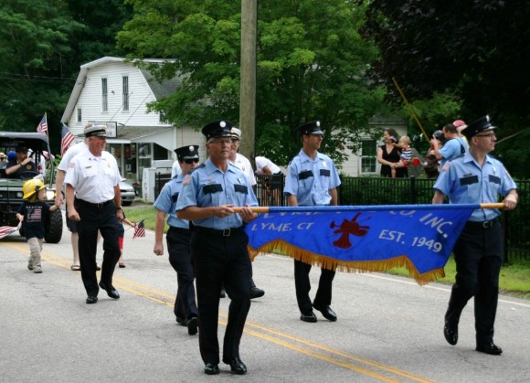 Photo by C. Judy.  The Lyme Fire Department does its thing for the parade.