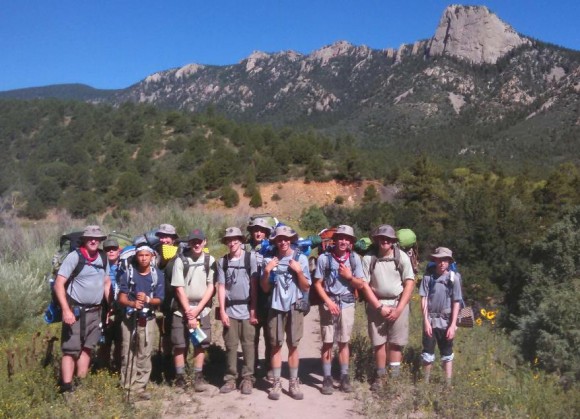 The Philmont crew standing in front of the 'Tooth of Time' prior to making the 9,000 ft. ascent.