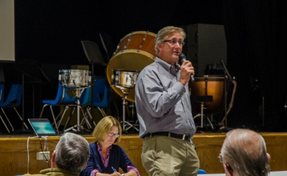 Dr. Gregory Hack, Co-President of the Old Lyme Rowing Association, responds to a question at Monday's meeting.