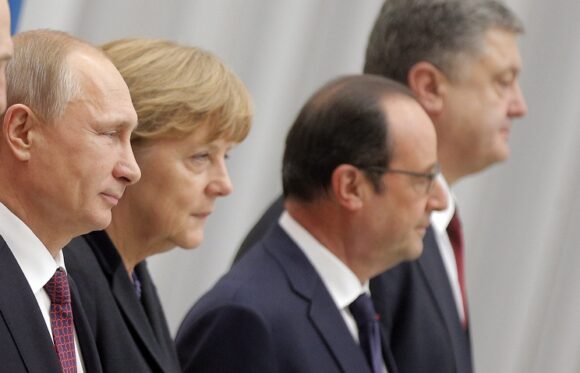 From left to right, Vladimir Putin, Angela Merkel, François Hollande and Petroshenko.