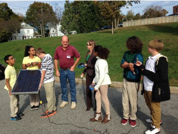 An MCCD member works with students in New London on the new STEM program initiated by the MCCD.