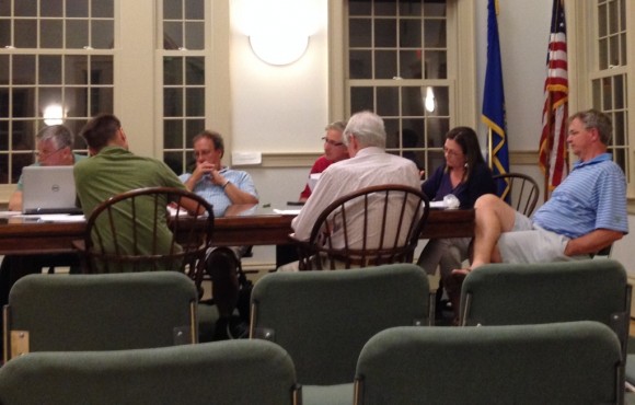 Members of the Hains Park Boathouse Improvement Committee consider the new design proposal.