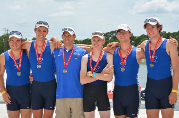 The Us Rowing Junior Nationals silver medal team and (third from left) their coach Louis Zubek.