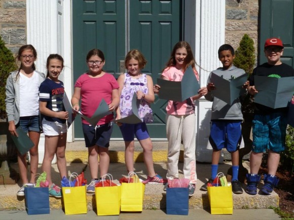 The 'Celebrate Center' Committee stands in front of the school (left to right): Lauren Presti, Elise DeBernardo,  Lizzy Duddy, Emily Nickerson, Zoe Jensen, Gabe Katwaru, and John Coffey. Missing from photo: Anne Colangelo.