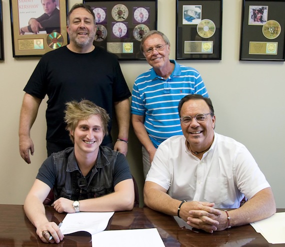 Seated from left to right are Zach Lockwood and Chris Hunter, Pres. Old Gringo Music. Standing from left to right are Kenneth Wright, Pres. Dis Keef Music and Orville Almon, Jr.,ESQ., Almon & McPike, PLLC.