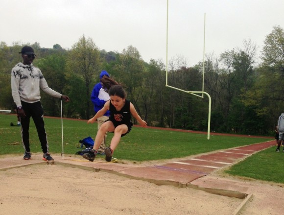 Zoe Eastman-Grossel leaps to victory in the Junior Olympics qualifying event.