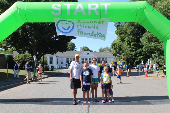 The O'Brien family stand at the starting line.