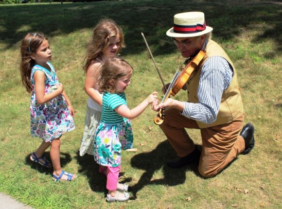 .. and sheer delight  for this little girl as she plucked a violin string for this Wandering Minstrel! 