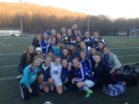 Co-champions! The Old Lyme girls gather for a photo to celebrate their shared victory in the Class S state tournament.