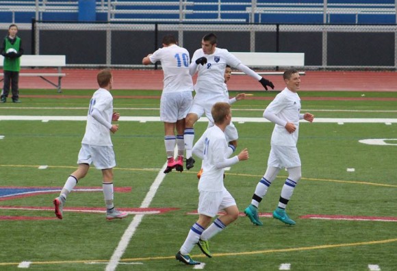 Victory! Old Lyme players celebrate their victory over Cromwell. Photo by E.Z. Cole.