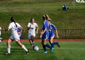 Caroline Wallace in action for the Wildcats.