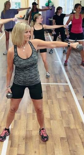 Donna Scott leads participants in a class at Essex Wellness Center.