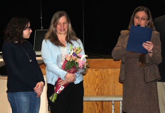 Old Lyme First Selectwoman Bonnie Reemsnyder reads the Citizen of the Year Citation to Seidner (left).