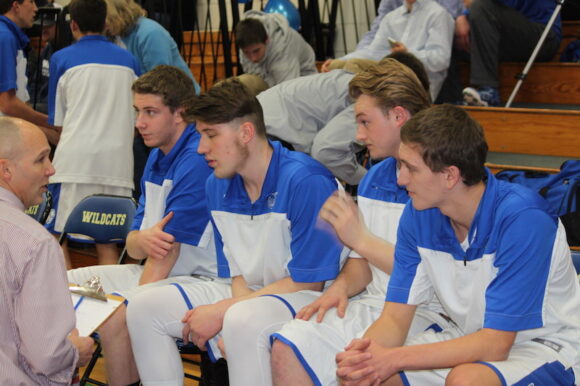 Coach Kaczor gives advice to his seniors during the team's 49-46 victory over East Hampton last Saturday.
