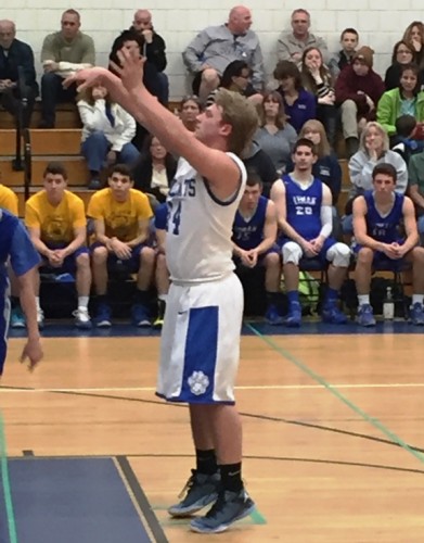 Josh Turkowski makes a shot from the foul line during last night's game against Lyman Memorial.