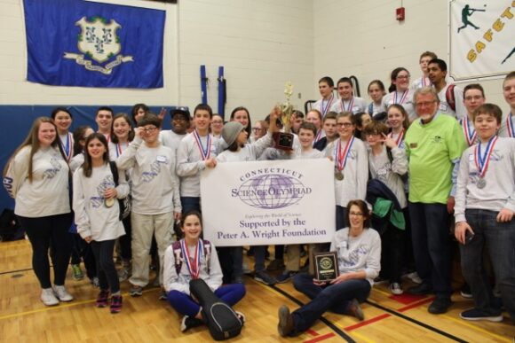 Members of the Lyme-Old Lyme Science Olympiad team gather for a photo at the end of the contest.