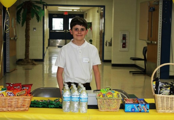 This young man was all ready for the roaring trade of concession sales during the evening.