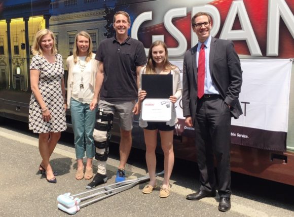Standing outside the C-SPAN bus are (from left to right) Kristen Roberts, Michelle Dean, Daisy Colvin, Bill Eydman (recuperating after knee surgery) and Josh Koning.