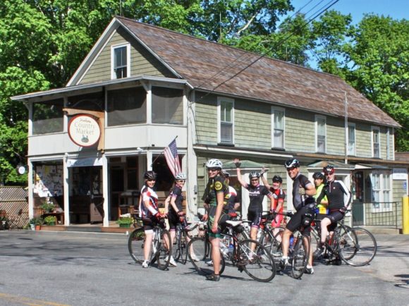 Bicyclists take a break in front of the Hadlyme Country Market.