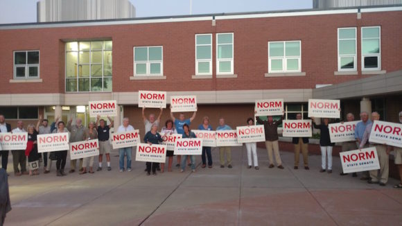 Norm Needleman had a significant crowd of supporters, who stood outside the High School prior to the debate.